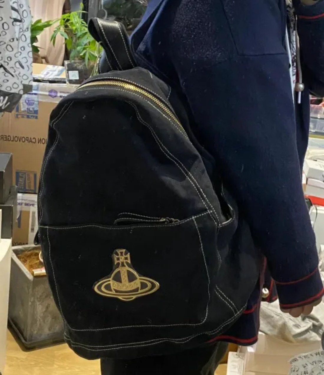 Canvas Zip Backpack with Front Emblem