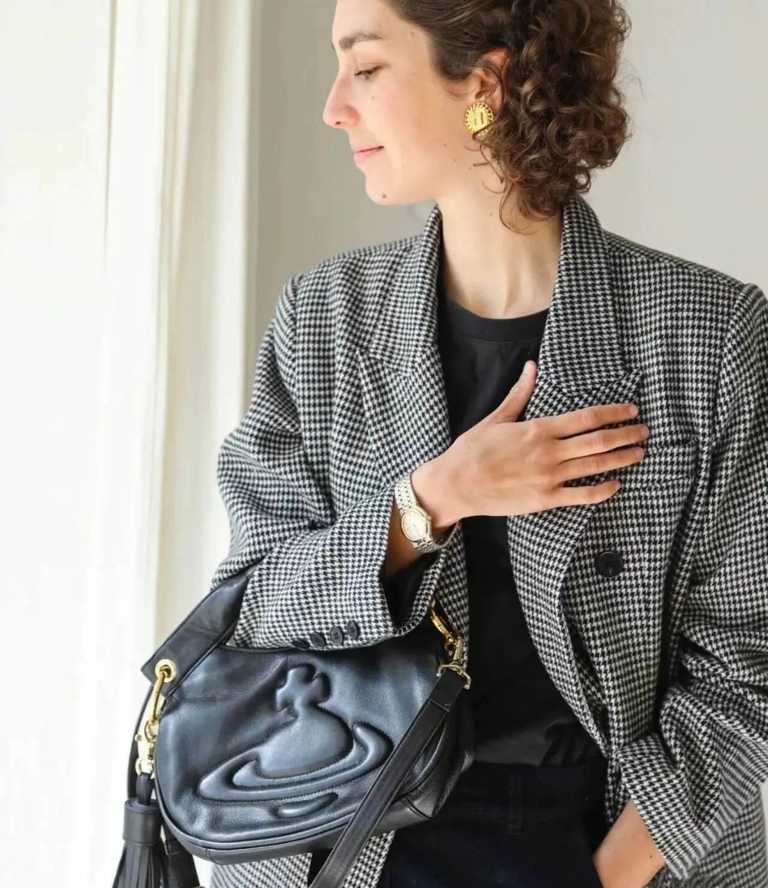 Curved Saturn Leather Bag