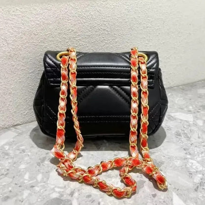 Quilted Saturn Crossbody Bag