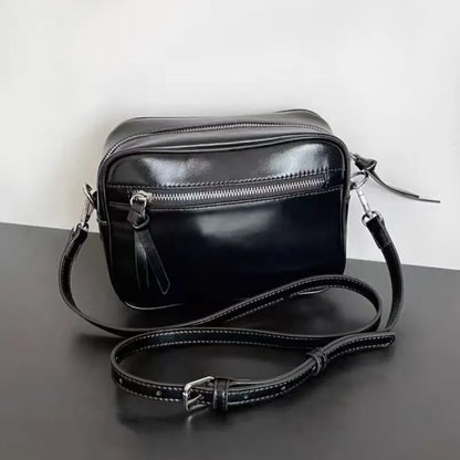 Compact Leather Crossbody Saturn Bag