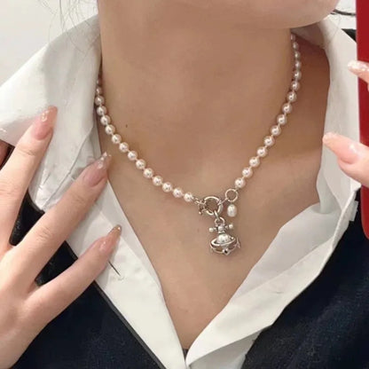 MARIALENA Nautical Pearl Necklace with Anchor & Orb Pendant