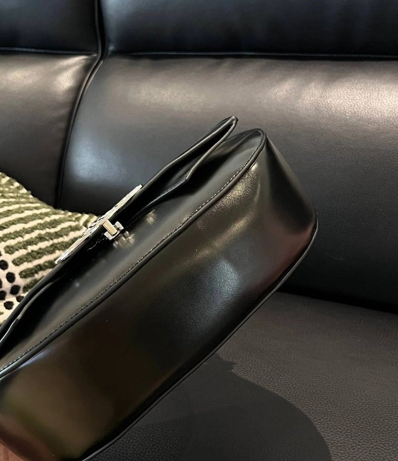 Curved Leather Saturn Shoulder Bag