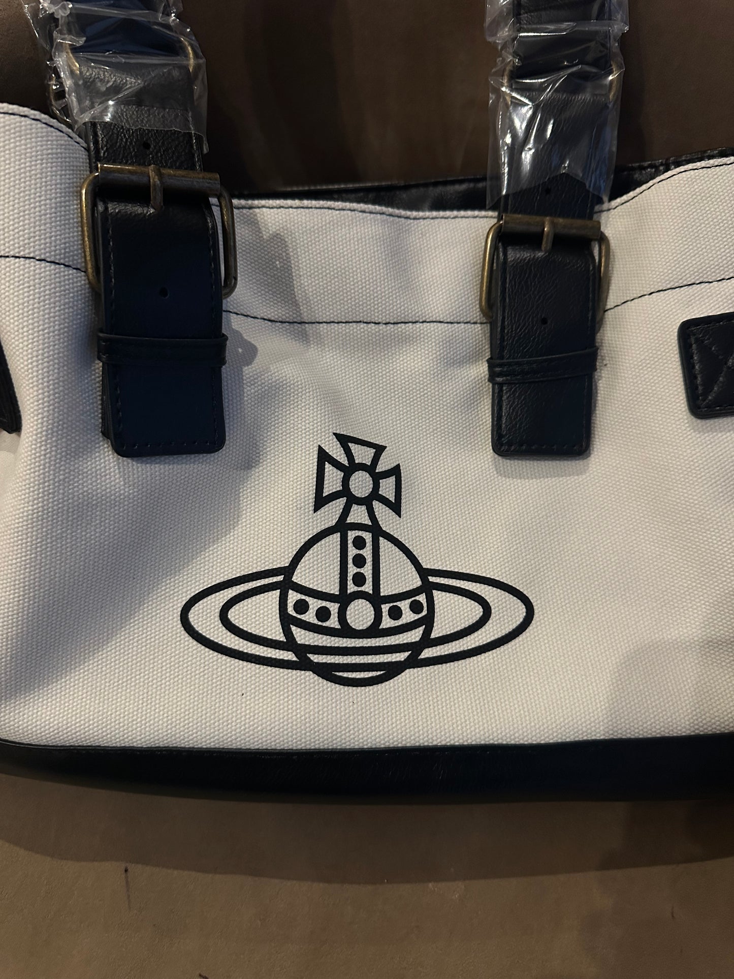 Vwnana Cream leather messenger bag (with dust bag)