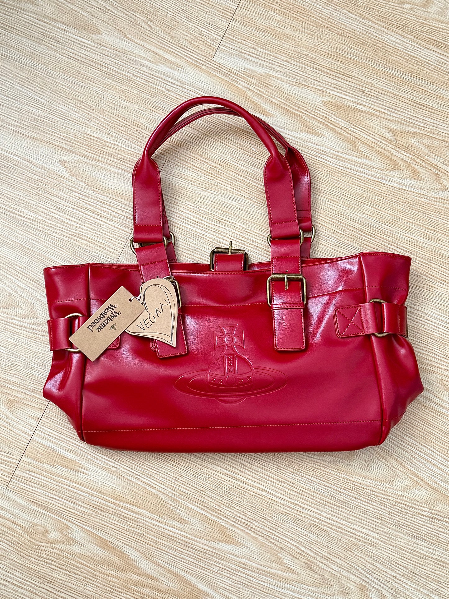 Cherry red Vwnana’s leather messenger bag (with dust bag) + free cardholder gift