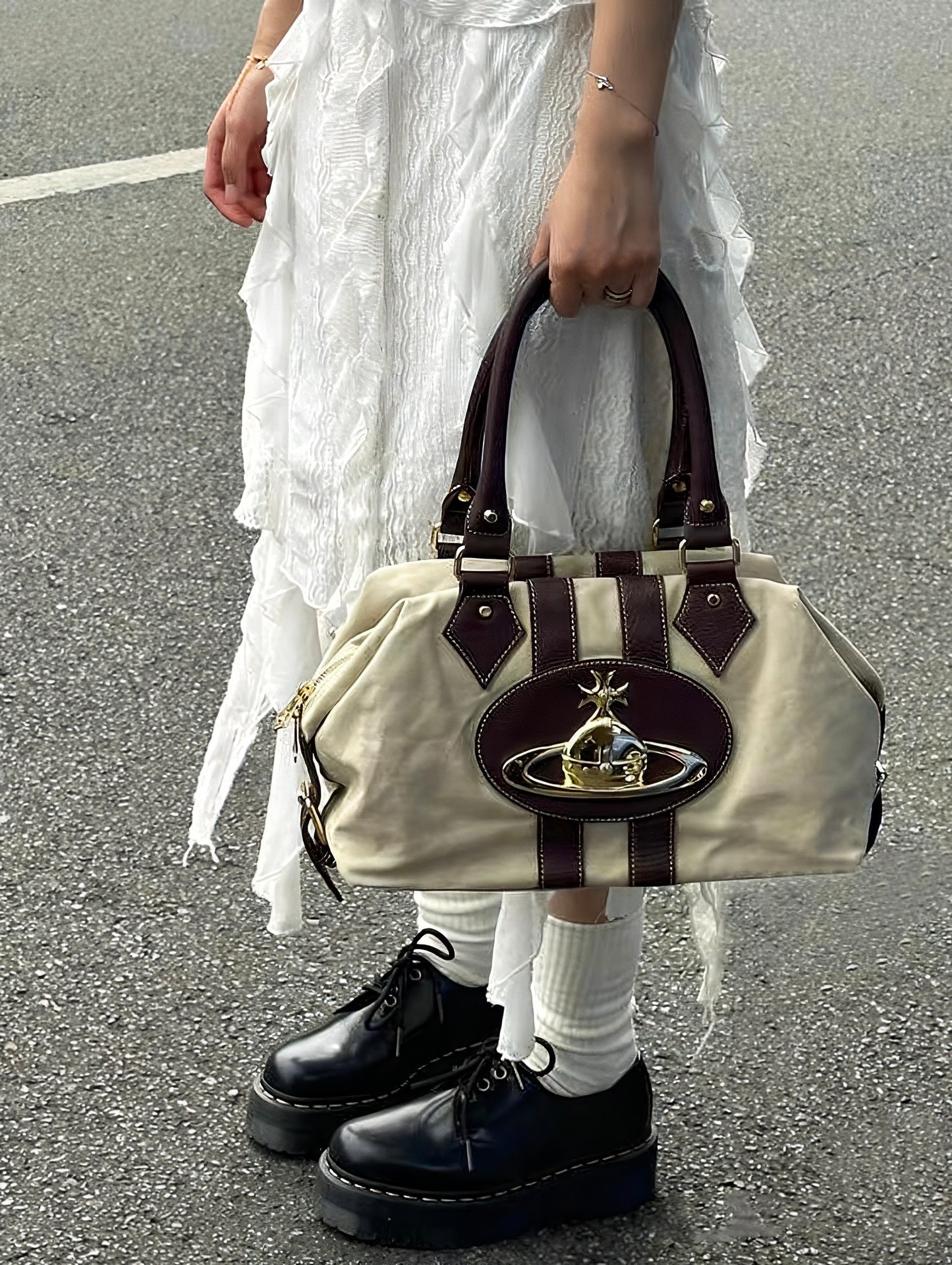 Cream orb shoulder bag